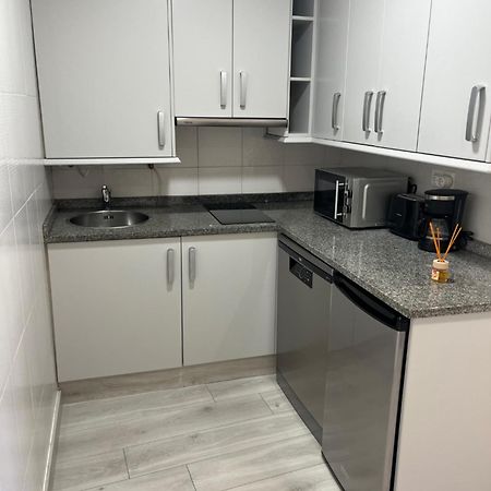 Apartamentos Turisticos Palacio De Meras Тинео Екстериор снимка